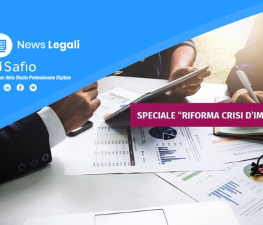 Professionisti analizzano documenti fiscali e grafici per riforma crisi d'impresa e concordato